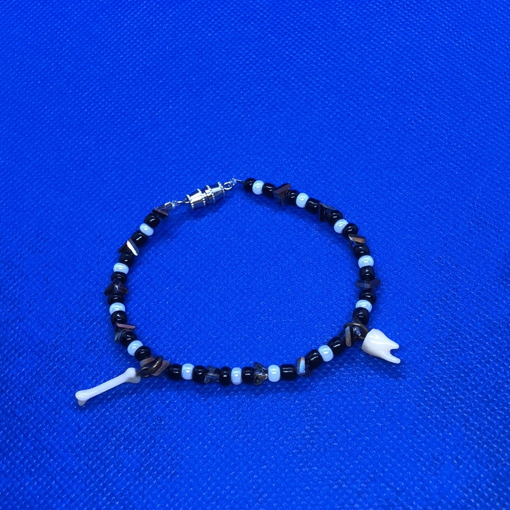 black and white beaded bracelet with bone charms (handmade)